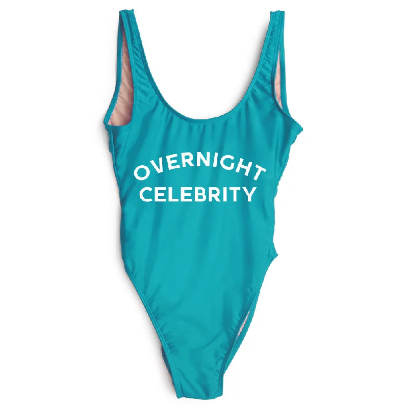 One - piece women swimwear with cut - outs for a stylish and modern appealOVERNIGHT CELEBRITY [SWIMSUIT]