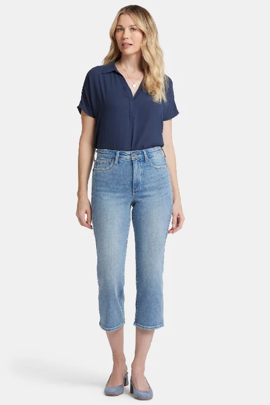 Ripped women jeans for a rebellious and fashion - forward styleJoni Relaxed Capri Jeans - Blue Valley